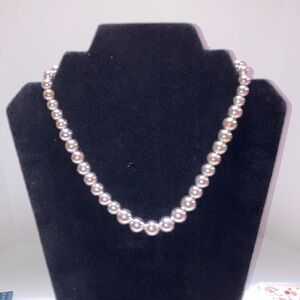 Graduated silver tone bead necklace size 16 to 18 inches